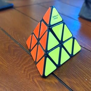 3/$30.Meffert's pyramid cube puzzle.